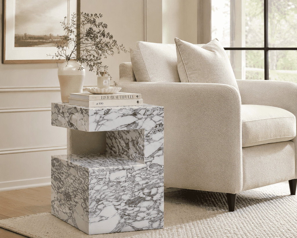 Marble accent table bringing timeless style to a cozy seating area.