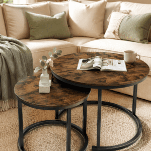 Rustic round nesting coffee tables with wood finish and black metal frame in a cozy modern living room