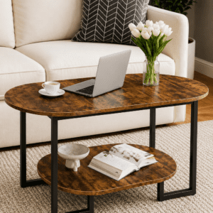 Rustic oval coffee table with lower storage shelf and black metal frame in a cozy modern living room