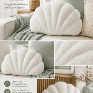 Soft white coastal shell throw pillow on a cozy sofa with sage green cushions and a knitted throw blanket, creating a relaxing beach-inspired living room.