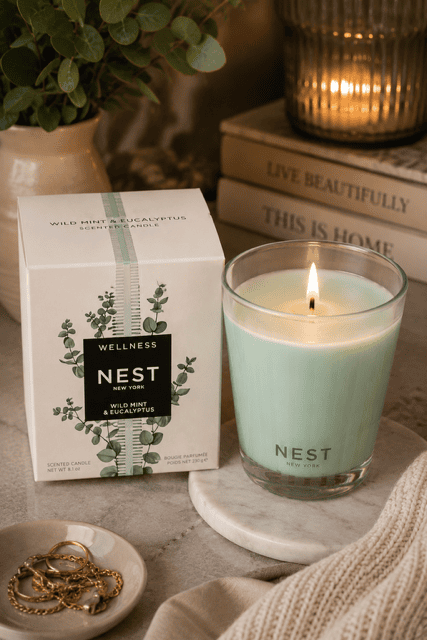 Nest New York Wild Mint and Eucalyptus scented candle with elegant packaging styled for spa-inspired home decor.