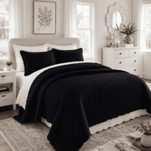 Black farmhouse quilt set styled on a white bed in a bright modern bedroom with neutral decor, woven pendant light, white furniture, soft natural lighting, and cozy farmhouse accents.
